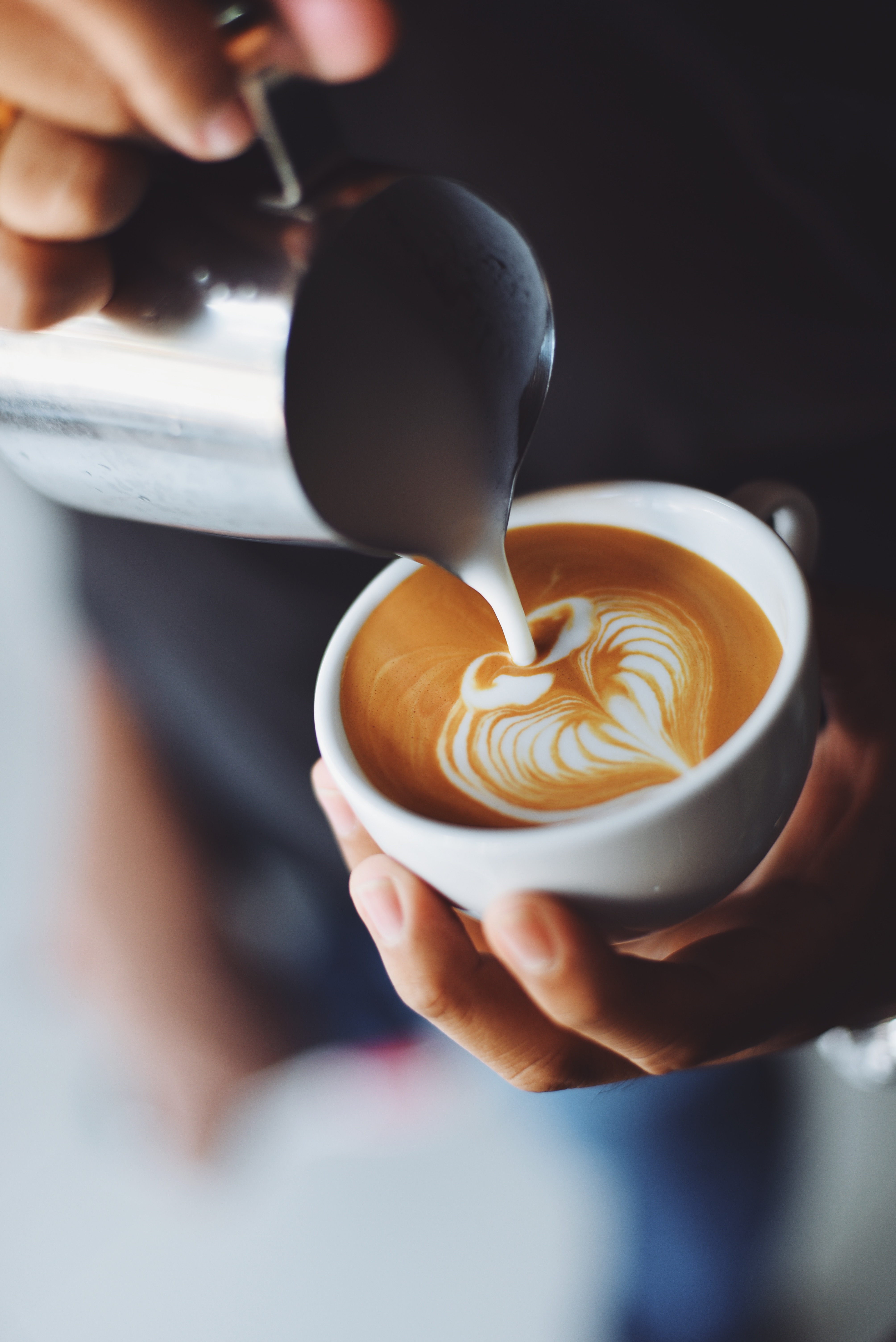 Barista serving coffee